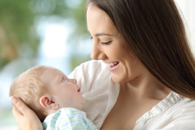 Proud mother holding her baby