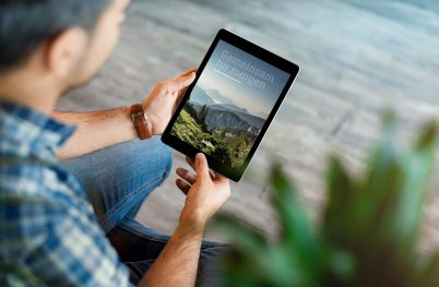 Man using tablet computer. Clipping path.